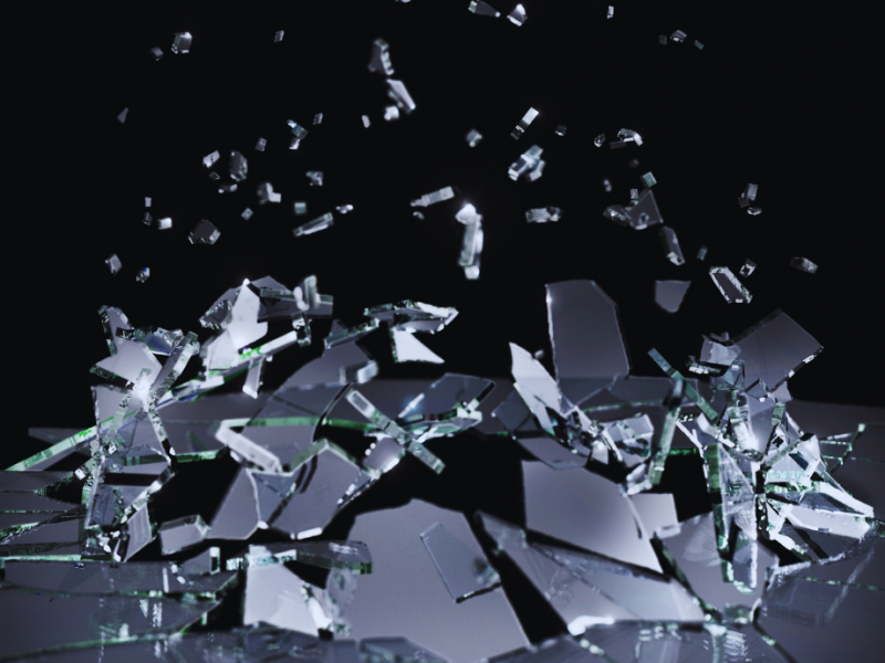 Glass shattering to represent the breaking of the disability glass veiling.